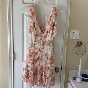 Express Ivory and Gold pleated fully lined mid opening midi Dress with bow. NWT